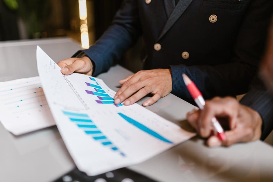 Business professionals reviewing financial analysis