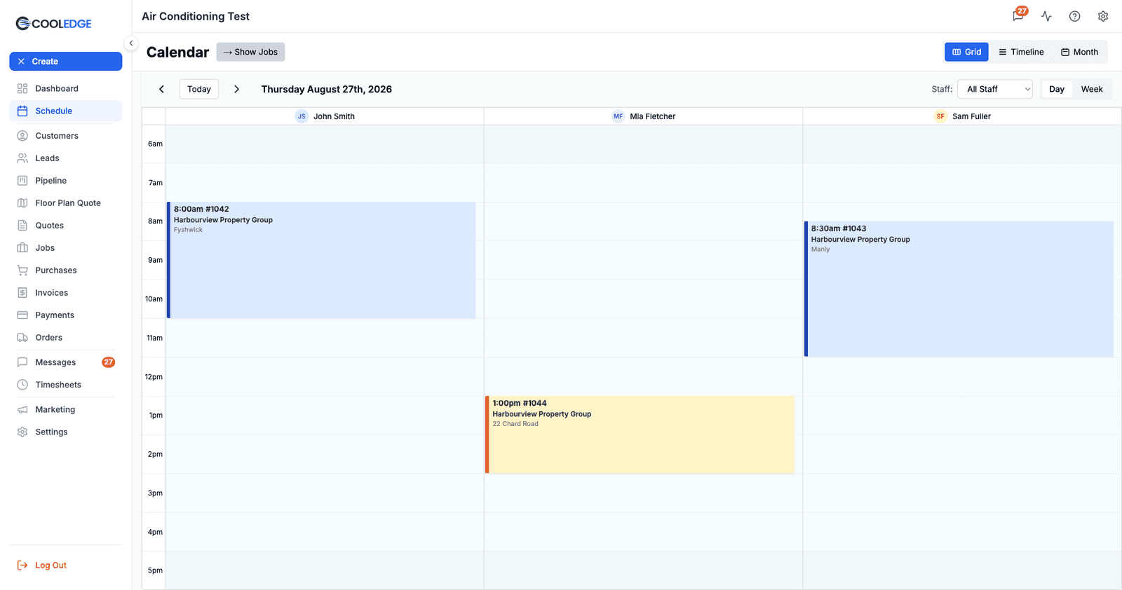 Grid Day view of the calendar, with each staff member in their own column and bookings placed in their time slots