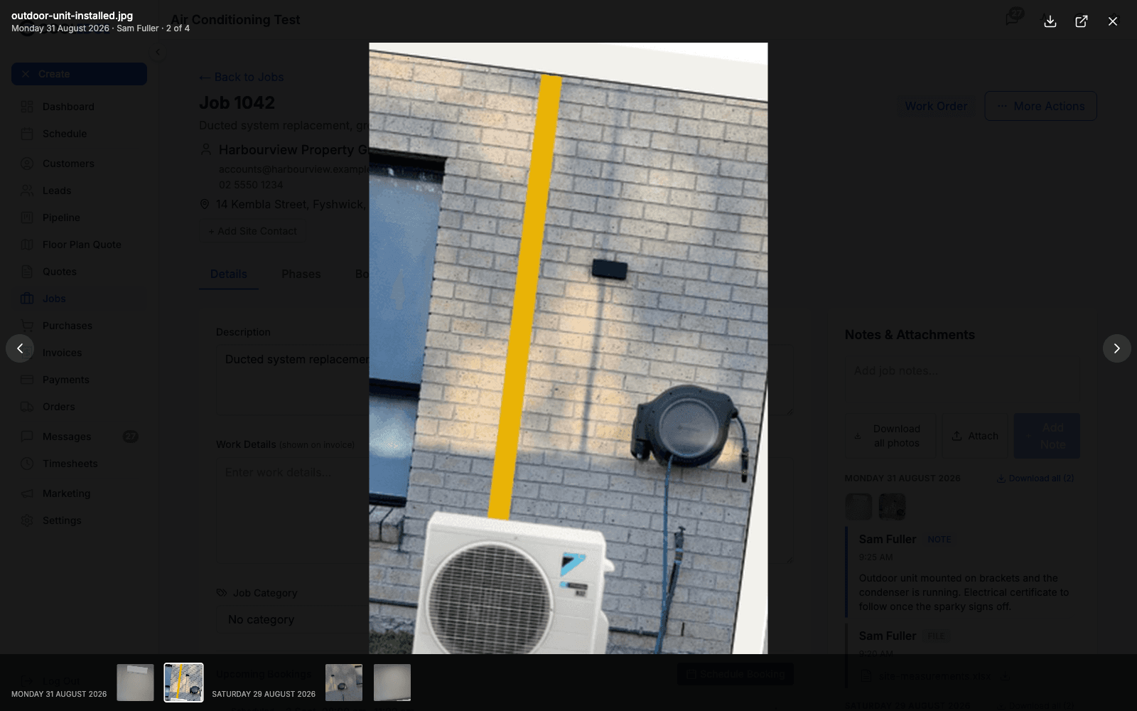 The portal lightbox open on a site photo, showing the filename, the day and author, the counter reading 2 of 4, arrows either side and the strip of thumbnails along the bottom